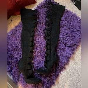 Thigh high black tie up boots. Super sexy. Size 7.5